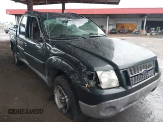 2003 Ford Explorer Sport Trac XLS z VIN 1FMZU77E73UB07352, wystawiony jako IAAI lot #41803900 z przebiegiem 153 433 mil mil oraz . Historia ofert i sprzedaży dostępna na DreamBid. Obrazek 1.