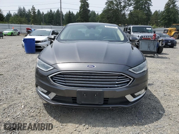 2017 Ford Fusion Titanium z VIN 3FA6P0K95HR139060, wystawiony jako Copart lot #62200755 z przebiegiem 106 133 mil mil oraz Szkoda całkowita • Salvage title. Historia ofert i sprzedaży dostępna na DreamBid. Obrazek 5.