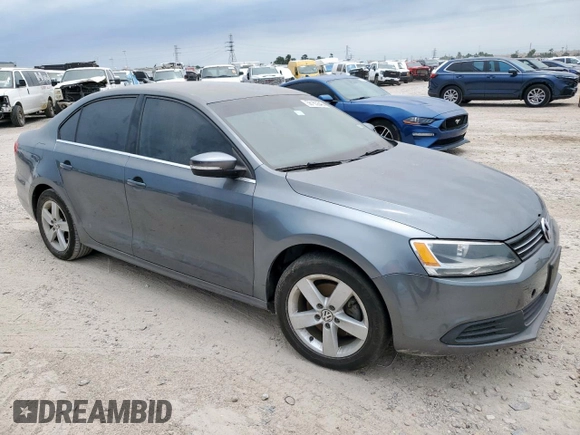 2014 Volkswagen Jetta TDI w/Premium with VIN 3VWLL7AJ9EM267112, listed as a Copart auction lot 58163545 with 106,367 mi miles and Clean title. Bid and sale history available at DreamBid. Image 4.