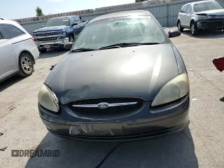 2002 Ford Taurus SE Standard with VIN 1FAFP53U12G147672, listed as a Copart auction lot 62173665 with 161,369 mi miles and Salvage title. Bid and sale history available at DreamBid. Image 14.