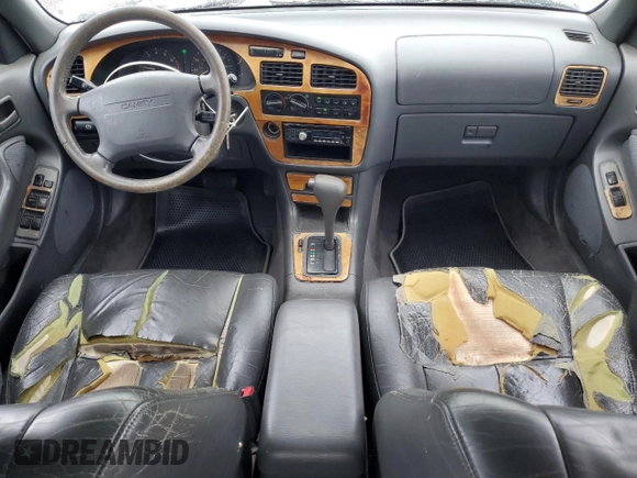 1994 Toyota Camry XLE with VIN JT2GK13E5R0008509, listed as a Copart auction lot 76014164 with 188,427 mi miles and Salvage Title. Bid and sale history available at carsss.com. Image 8.