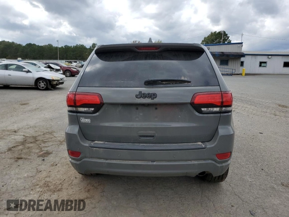 2020 Jeep Grand Cherokee Laredo E with VIN 1C4RJEAG0LC404979, listed as a Copart auction lot 81999474 with 57,328 mi miles and Salvage title. Bid and sale history available at DreamBid. Image 6.