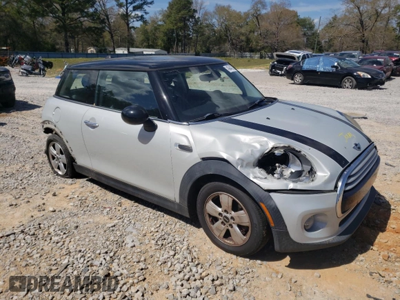 2014 MINI Hardtop with VIN WMWXM5C58ET933123, listed as a Copart auction lot 49443185 with 152,771 mi miles and Salvage Title. Bid and sale history available at DreamBid. Image 4.