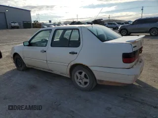 1998 Volkswagen Jetta z VIN 3VWVA81H4WM127083, wystawiony jako Copart lot #88396925 z przebiegiem 192 757 mil mil oraz Szkoda całkowita • Salvage title. Historia ofert i sprzedaży dostępna na DreamBid. Obrazek 2.