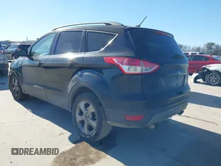 2016 Ford Escape SE with VIN 1FMCU0G99GUC19883, listed as a IAAI auction lot 41726858 with 156,863 mi miles. Bid and sale history available at carsss.com. Image 3.