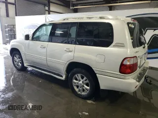 2004 Lexus LX 470 z VIN JTJHT00WX43539807, wystawiony jako Copart lot #87842755 z przebiegiem 335 478 mil mil oraz Czysty tytuł • Clean title. Historia ofert i sprzedaży dostępna na DreamBid. Obrazek 2.