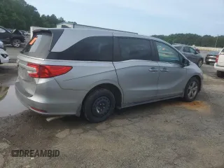 2018 Honda Odyssey EX-L with VIN 5FNRL6H74JB099282, listed as a Copart auction lot 55031025 with 137,359 mi miles and Salvage Title. Bid and sale history available at DreamBid. Image 3.