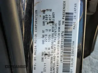 2012 Mazda 3 S Touring with VIN JM1BL1L69C1512876, listed as a Copart auction lot 69316034 with 70,944 mi miles and Salvage Title. Bid and sale history available at DreamBid. Image 12.