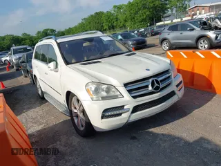 2011 Mercedes-Benz GL-Class GL 450 with VIN 4JGBF7BE1BA709277, listed as a IAAI auction lot 42163011 with 140,130 mi miles. Bid and sale history available at carsss.com. Image 1.