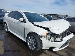 2013 Mitsubishi Lancer GT with VIN JA32U8FW7DU011260, listed as a IAAI auction lot 41233707 with 165,183 mi miles. Bid and sale history available at carsss.com. Image 1.