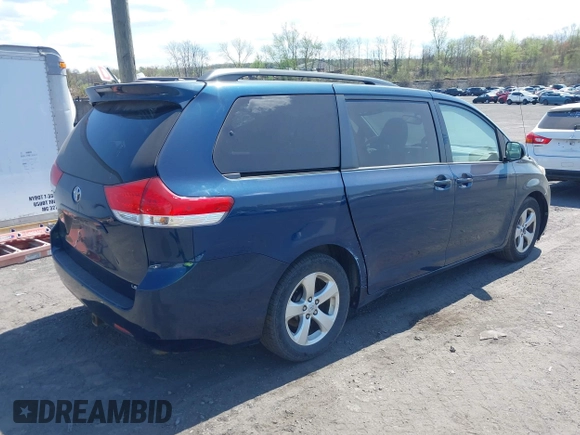 2012 Toyota Sienna LE AAS with VIN 5TDKK3DC7CS274726, listed as a IAAI auction lot 42126219 with 184,158 mi miles. Bid and sale history available at carsss.com. Image 4.