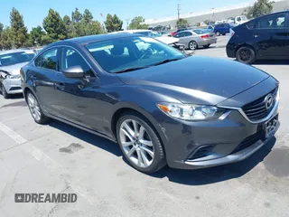 2014 Mazda 6 i Touring с VIN JM1GJ1V53E1106448, выставлен на аукционе IAAI как лот 42762861 с пробегом 140 275 миль миль и . История ставок и продаж доступна на DreamBid. Изображение 1.