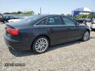 2014 Audi A6 Prestige with VIN WAUHGAFC8EN148314, listed as a Copart auction lot 59018825 with 68,450 mi miles and Salvage title. Bid and sale history available at DreamBid. Image 3.