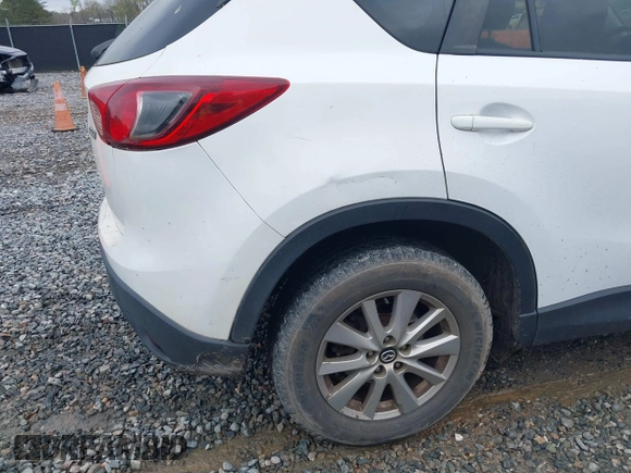 2015 Mazda CX-5 Touring with VIN JM3KE2CY4F0436664, listed as a IAAI auction lot 41876238 with 374,305 mi miles. Bid and sale history available at carsss.com. Image 19.