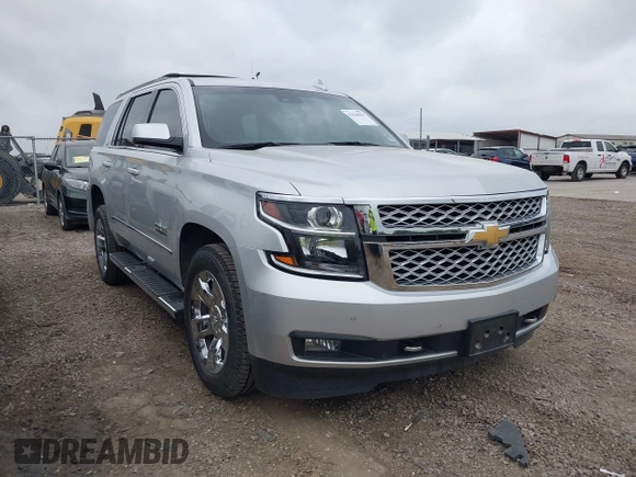 2019 Chevrolet Tahoe LT z VIN 1GNSCBKC1KR191789, wystawiony jako IAAI lot #42144961 z przebiegiem 94 178 mil mil oraz . Historia ofert i sprzedaży dostępna na DreamBid. Obrazek 1.