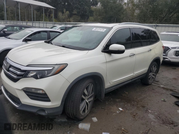 2017 Honda Pilot Touring with VIN 5FNYF6H99HB025600, listed as a Copart auction lot 88131475 with 131,939 mi miles and Salvage Title. Bid and sale history available at DreamBid. Image 1.