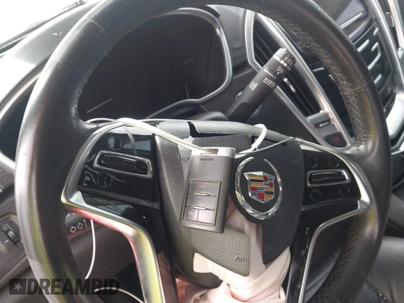 2013 Cadillac SRX z VIN 3GYFNAE3XDS654498, wystawiony jako IAAI lot #41740938 z przebiegiem 134 933 mil mil oraz . Historia ofert i sprzedaży dostępna na DreamBid. Obrazek 11.