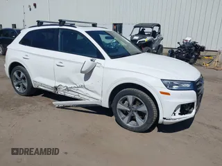 2020 Audi Q5 Premium z VIN WA1ANAFY7L2111477, wystawiony jako IAAI lot #42083776 z przebiegiem 75 437 mil mil oraz . Historia ofert i sprzedaży dostępna na DreamBid. Obrazek 1.