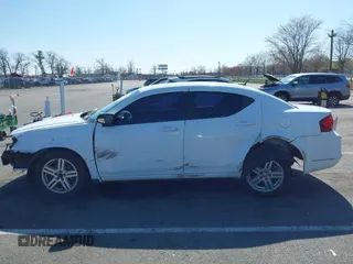 2012 Dodge Avenger SXT with VIN 1C3CDZCB7CN196369, listed as a IAAI auction lot 41932665 with 136,568 mi miles and . Bid and sale history available at carsss.com. Image 14.