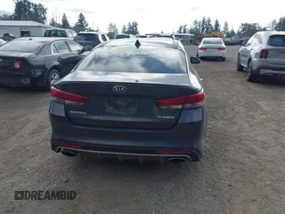 2016 Kia Optima SX Turbo z VIN 5XXGW4L28GG010897, wystawiony jako IAAI lot #42703779 z przebiegiem 121 918 mil mil oraz . Historia ofert i sprzedaży dostępna na DreamBid. Obrazek 17.