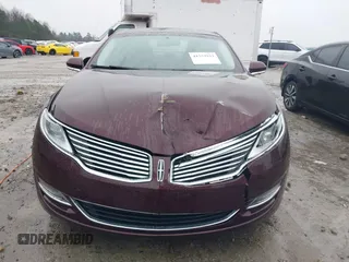 2013 Lincoln MKZ z VIN 3LN6L2G96DR825348, wystawiony jako IAAI lot #41553933 z przebiegiem 43 529 mil mil oraz . Historia ofert i sprzedaży dostępna na DreamBid. Obrazek 12.