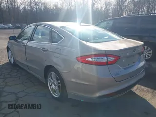 2015 Ford Fusion SE Hybrid with VIN 3FA6P0LUXFR133979, listed as a IAAI auction lot 41831288 with 143,738 mi miles. Bid and sale history available at carsss.com. Image 3.