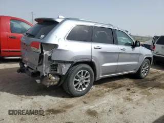 2014 Jeep Grand Cherokee Overland with VIN 1C4RJFCG4EC326325, listed as a Copart auction lot 49166645 with 128,261 mi miles and Salvage Title. Bid and sale history available at DreamBid. Image 3.