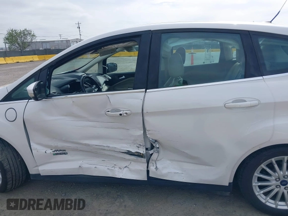 2016 Ford C-Max Energi SEL with VIN 1FADP5CUXGL102011, listed as a IAAI auction lot 41935337 with 95,279 mi miles. Bid and sale history available at carsss.com. Image 14.