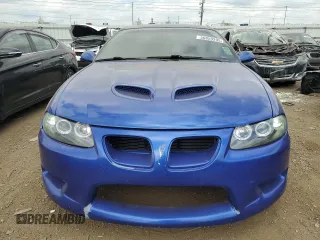 2004 Pontiac GTO z VIN 6G2VX12G04L223636, wystawiony jako Copart lot #56859295 z przebiegiem 183 192 mil mil oraz Szkody całkowita. Historia ofert i sprzedaży dostępna na DreamBid. Obrazek 5.