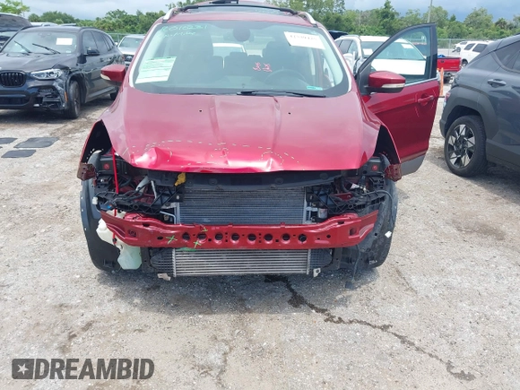 2013 Ford Escape Titanium with VIN 1FMCU0J96DUC67636, listed as a IAAI auction lot 42539425 with 120,593 mi miles and . Bid and sale history available at DreamBid. Image 6.