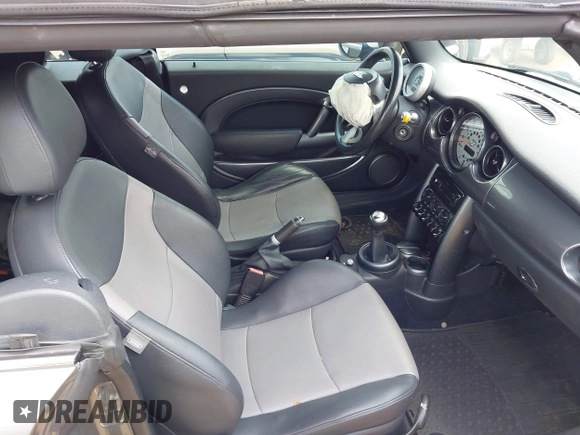 2006 MINI Convertible S with VIN WMWRH33516TF89141, listed as a IAAI auction lot 42273093 with 174,772 mi miles and . Bid and sale history available at DreamBid. Image 5.