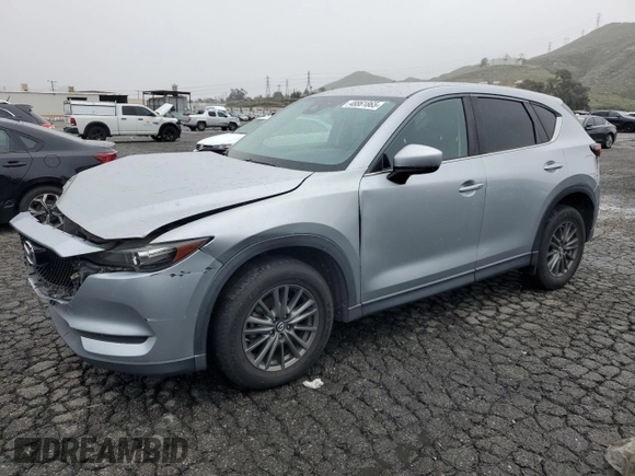 2017 Mazda CX-5 Touring with VIN JM3KFACL9H0183937, listed as a Copart auction lot 48861865 with 91,268 mi miles and Salvage Title. Bid and sale history available at carsss.com. Image 1.