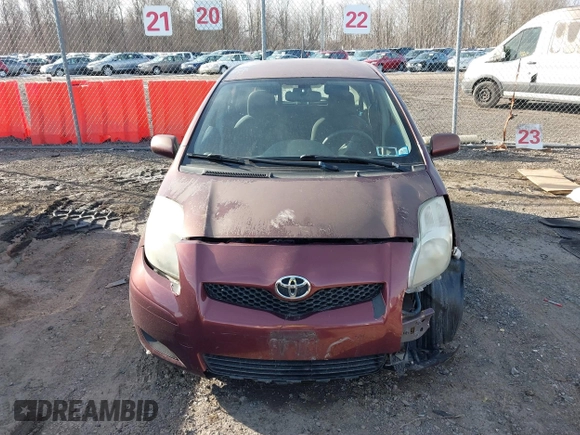 2009 Toyota Yaris with VIN JTDKT903X95258654, listed as a IAAI auction lot 41759756 with 93,810 mi miles. Bid and sale history available at carsss.com. Image 12.