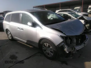 2014 Honda Odyssey EX-L with VIN 5FNRL5H65EB058750, listed as a IAAI auction lot 41853116 with 177,933 mi miles and . Bid and sale history available at carsss.com. Image 1.