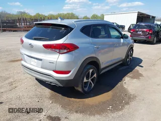 2018 Hyundai Tucson Sport with VIN KM8J33AL1JU817635, listed as a IAAI auction lot 41889913 with 78,255 mi miles. Bid and sale history available at carsss.com. Image 4.