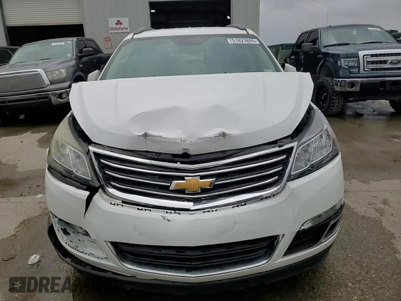 2016 Chevrolet Traverse LT z VIN 1GNKRHKDXGJ186560, wystawiony jako Copart lot #51823695 z przebiegiem 130 479 mil mil oraz Szkoda całkowita • Salvage title. Historia ofert i sprzedaży dostępna na DreamBid. Obrazek 14.