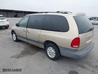 1999 Dodge Caravan SE with VIN 1B4GP44G8XB880093, listed as a IAAI auction lot 41501972 with 179,018 mi miles. Bid and sale history available at carsss.com. Image 3.