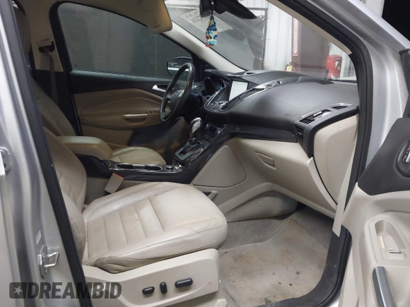 2015 Ford Escape Titanium with VIN 1FMCU0J96FUB81598, listed as a IAAI auction lot 41872114 with 122,001 mi miles and . Bid and sale history available at DreamBid. Image 5.