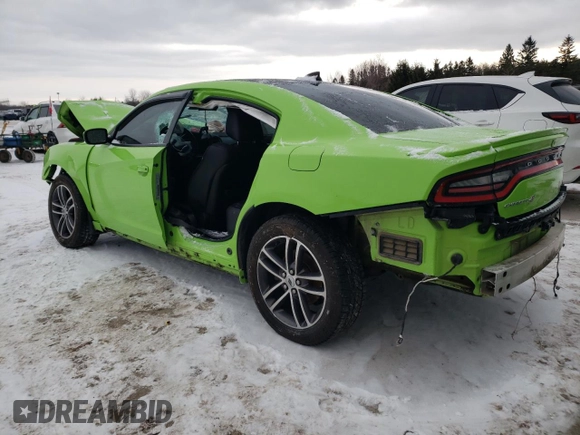 2019 Dodge Charger SXT with VIN 2C3CDXJG1KH706449, listed as a Copart auction lot 85907394 with 147,526 mi miles and Salvage Title. Bid and sale history available at DreamBid. Image 2.