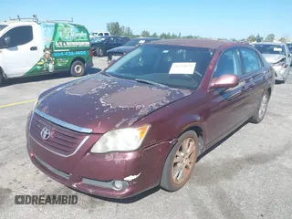 2008 Toyota Avalon XL with VIN 4T1BK36BX8U309181, listed as a IAAI auction lot 41819670 with 227,129 mi miles. Bid and sale history available at carsss.com. Image 6.