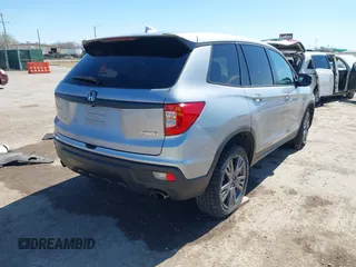 2021 Honda Passport EX-L with VIN 5FNYF8H51MB024752, listed as a IAAI auction lot 41858129 with 77,545 mi miles and . Bid and sale history available at carsss.com. Image 4.