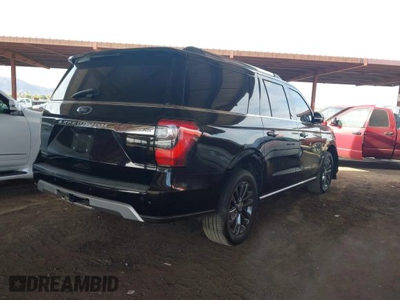 2021 Ford Expedition Max Limited with VIN 1FMJK1KT6MEA25162, listed as a IAAI auction lot 42650891 with 81,477 mi miles and . Bid and sale history available at DreamBid. Image 4.