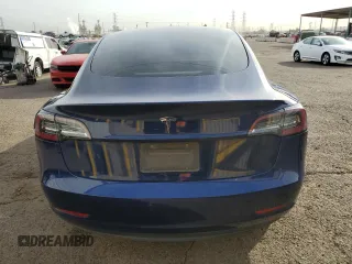 2023 Tesla Model 3 with VIN 5YJ3E1EA5PF449028, listed as a Copart auction lot 88924805 with 55,350 mi miles and Clean Title. Bid and sale history available at DreamBid. Image 6.