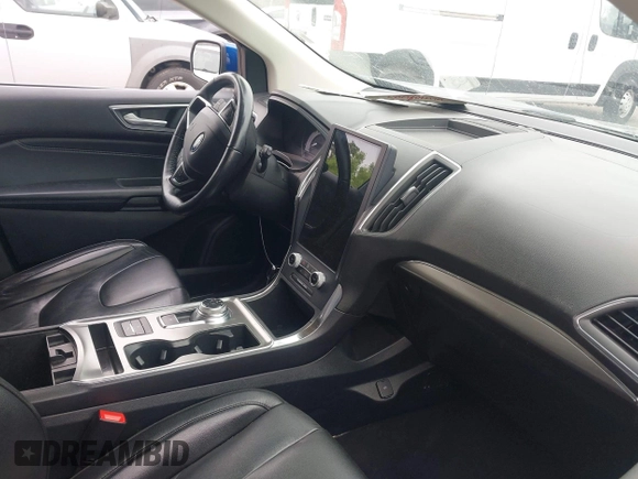 2022 Ford Edge Titanium with VIN 2FMPK4K95NBB05789, listed as a IAAI auction lot 42582372 with 58,379 mi miles and . Bid and sale history available at DreamBid. Image 5.