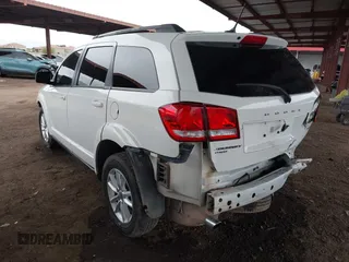 2017 Dodge Journey SXT z VIN 3C4PDDBG2HT595307, wystawiony jako IAAI lot #41813975 z przebiegiem 192 659 mil mil oraz . Historia ofert i sprzedaży dostępna na DreamBid. Obrazek 3.