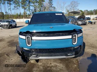 2022 Rivian R1T Launch Edition z VIN 7FCTGAAL7NN000539, wystawiony jako Copart lot #87811245 z przebiegiem Nie podano mil oraz Szkody całkowita. Historia ofert i sprzedaży dostępna na DreamBid. Obrazek 5.