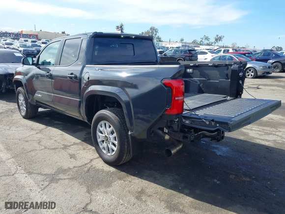 2024 Toyota Tacoma 4WD SR5 with VIN 3TMLB5JN7RM022456, listed as a IAAI auction lot 41430159 with 6,058 mi miles. Bid and sale history available at carsss.com. Image 3.