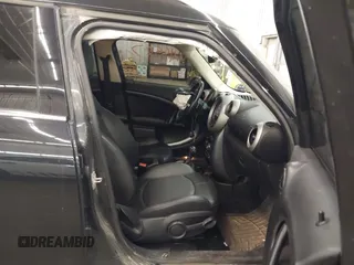 2012 MINI Countryman S z VIN WMWZC5C57CWL55975, wystawiony jako IAAI lot #42155876 z przebiegiem 126 637 mil mil oraz . Historia ofert i sprzedaży dostępna na DreamBid. Obrazek 5.