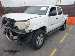 2014 Toyota Tacoma PreRunner z VIN 3TMJU4GN3EM170360, wystawiony jako IAAI lot #42438394 z przebiegiem 223 101 mil mil oraz . Historia ofert i sprzedaży dostępna na DreamBid. Obrazek 17.