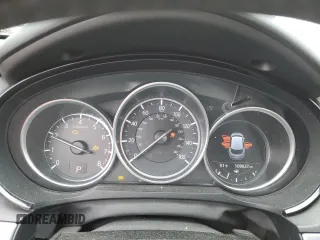 2018 Mazda CX-9 Grand Touring z VIN JM3TCBDYXJ0207231, wystawiony jako Copart lot #57911615 z przebiegiem 109 027 mil mil oraz Szkoda całkowita • Salvage title. Historia ofert i sprzedaży dostępna na DreamBid. Obrazek 9.